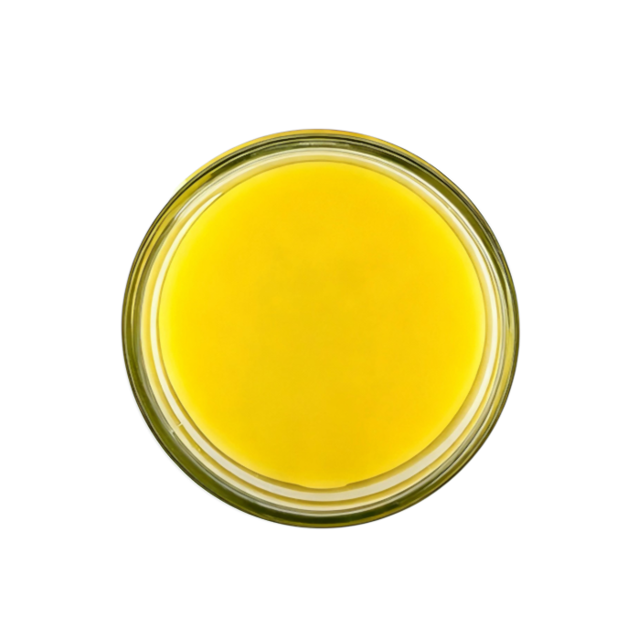 Natural beeswax cream jar photographed from above top down